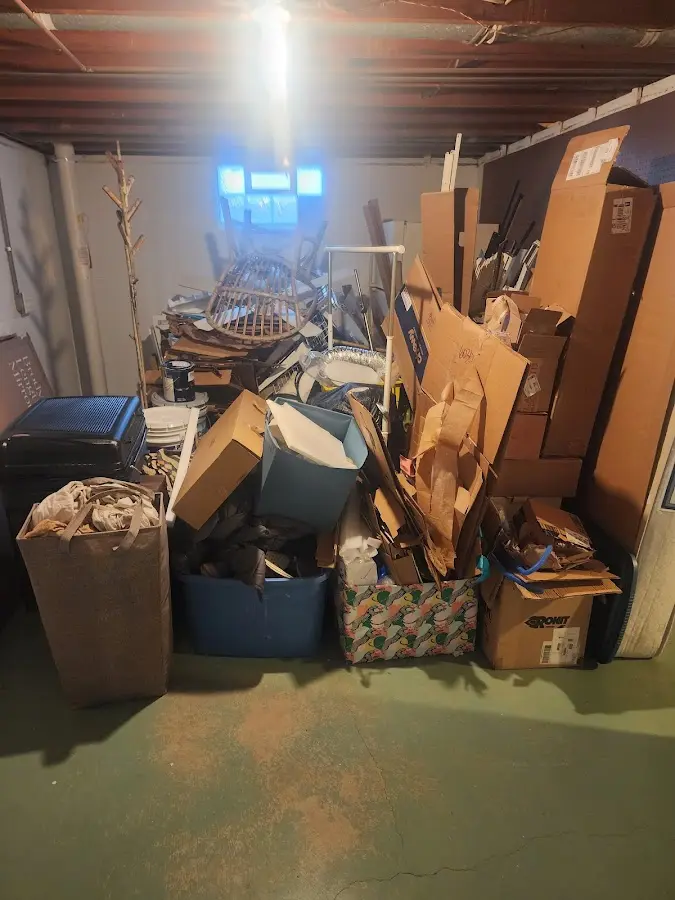 Roll-off dumpster container at job site for 6 Yard Dumpster Rental in Bourne